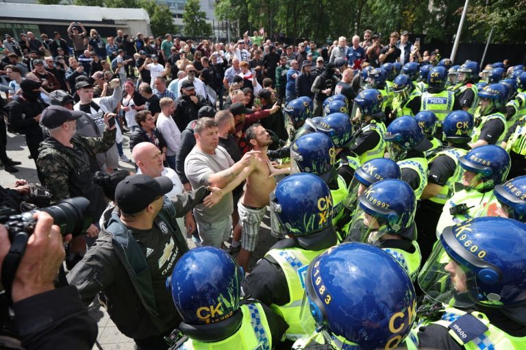 Dozens arrested in violent clashes across UK as government warns rioters ‘will pay the price’